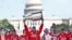 Washington Capitals' Alex Ovechkin, of Russia, holds up the Stanley Cup trophy during the NHL hockey team's Stanley Cup victory celebration, June 12, 2018, at the National Mall in Washington. 