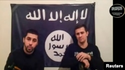 Men claiming to be from an Islamist militant group identifying itself as Vilayat Dagestan speak in this still image taken from video posted on the Internet on Jan. 20, 2014.