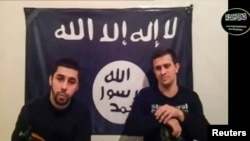 Men claiming to be from an Islamist militant group identifying itself as Vilayat Dagestan speak, in this still image taken from video posted on the Internet on Jan. 20, 2014.