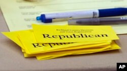 A stack cards used to help sort voters sits ready during voting in the South Carolina Republican Presidential Primary Saturday, Feb. 20, 2016, in Columbia, S.C. 