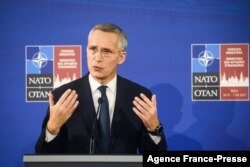 FILE - NATO Secretary General Jens Stoltenberg addresses a press conference during a meeting of NATO foreign ministers in Riga, Latvia, Nov. 30, 2021.