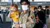 US Presses on With Evacuations After Airport Attacks