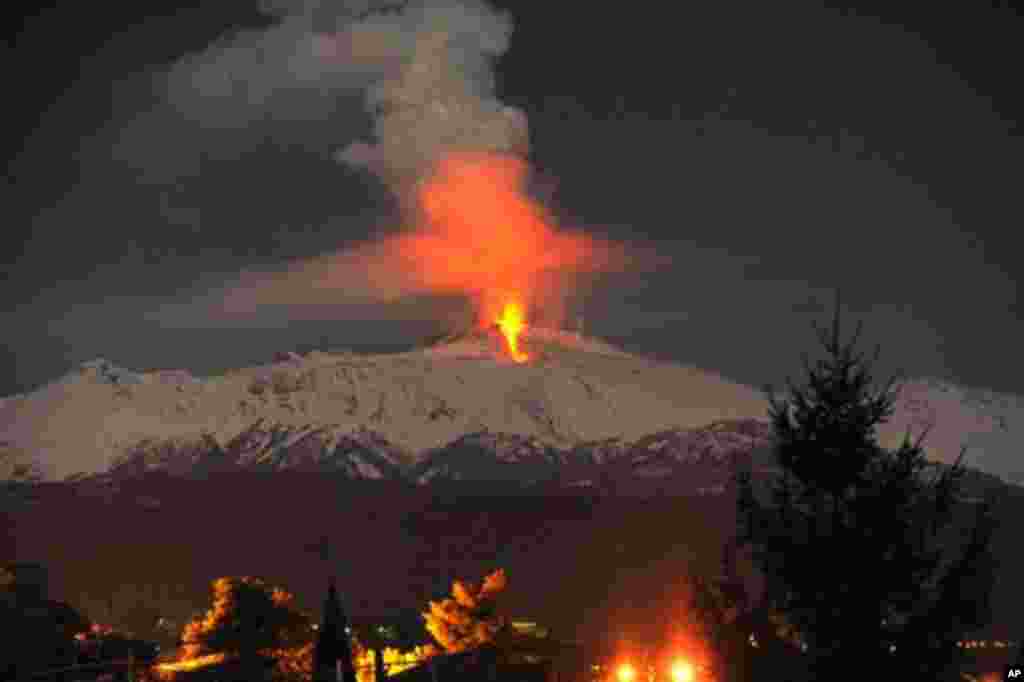 Lava flows during an eruption of Mt. Etna volcano, near Catania, Sicily, in the early hours of Thursday, Feb. 9, 2012.