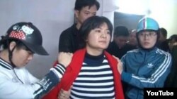 Hình ảnh bà Trần Thị Nga bị bắt giữ hôm 21/1.