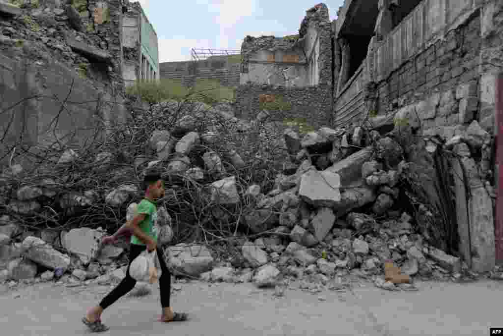 &quot;Islomiy Davlat&quot;ga qarshi kurash jarayonida xarobaga aylangan shahar. Mosul. Iroq.