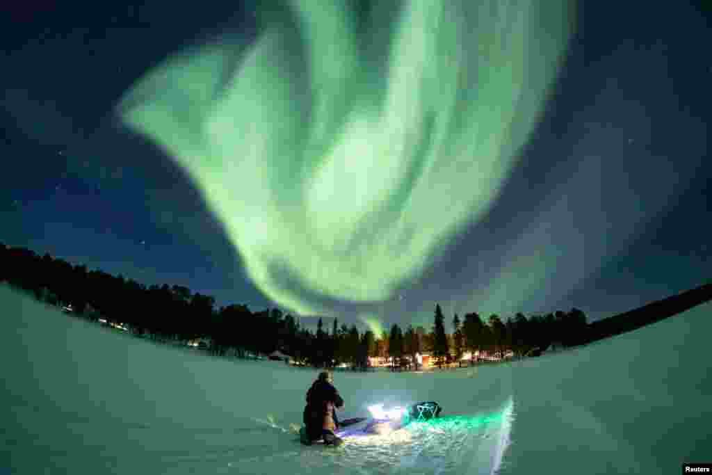 The Aurora Borealis (Northern Lights) is seen over the sky in Torassieppi in Lapland, Finland, March 2, 2021.
