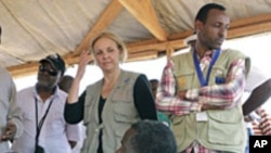 UN World Food Program Executive Director Josette Sheeran meets newly arrived Somali refugees at the Dadaab refugee camp, near the Kenya-Somalia, July 23, 2011