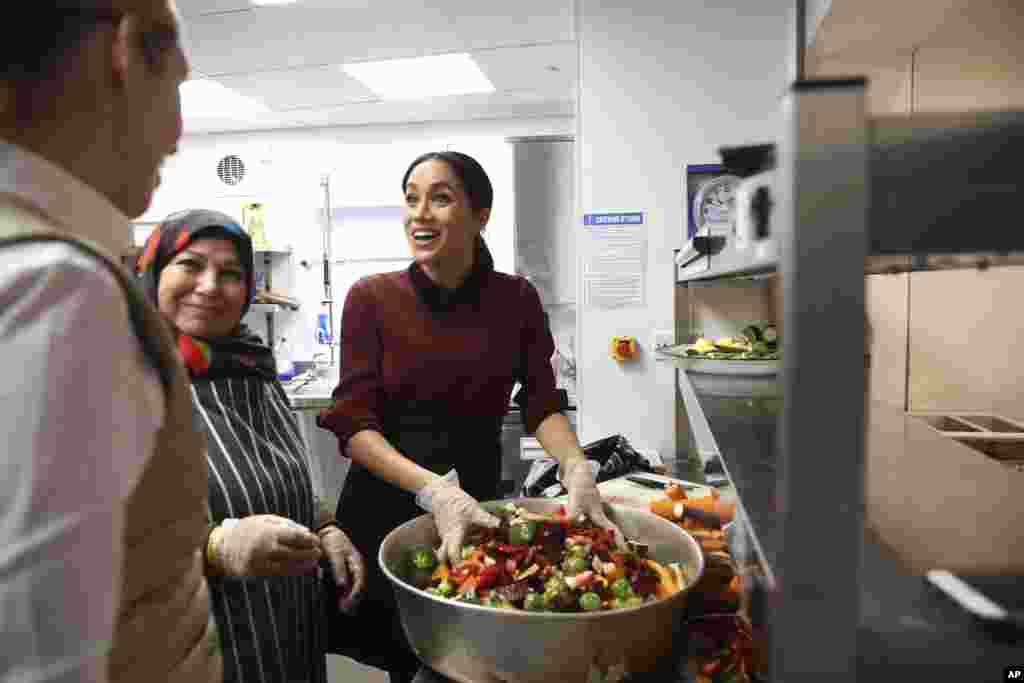 Meghan, Duchess of Sussex visits the Hubb Community Kitchen to see how funds raised by the &#39;Together: Our Community&#39; Cookbook are making a difference at Al Manaar, North Kensington in London.