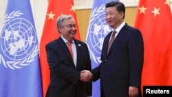 Le SG de l'ONU, Antonio Guterres, et le président chinois, Xi Jinping, Pékin, le 2 septembre 2018.