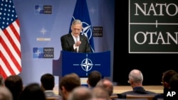 FILE - U.S. Defense Secretary Jim Mattis speaks during a press conference after a meeting of NATO defense ministers at the alliance's headquarters in Brussels, Belgium, Nov. 9, 2017.