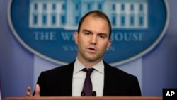 Deputy National Security adviser Ben Rhodes gestures as he speaks about President Barack Obama's decision to arm Syrian rebels, during the daily press briefing at the White House in Washington, June 14, 2013.