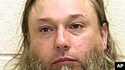 This undated photo provided by The Ford County Sheriff's Office in Paxton, Ill., shows Michael Hari. Hari, is the purported ringleader in the 2017 bombing of a Minnesota mosque.