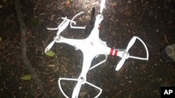 FILE - This handout photo provided by the US Secret Service shows the drone that crashed onto the White House grounds in Washington, Jan. 26, 2015.
