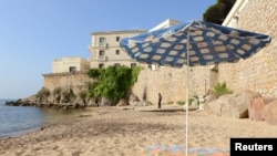 Locals object to a three-week closing of the public beach in front of the Saudi royal family's seaside villa in Vallauris, France. 