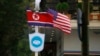 FILE - Flags of North Korea and the U.S are flown on a street in Hanoi, Vietnam, Feb. 19, 2019.