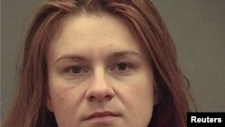 Maria Butina appears in a police booking photograph released by the Alexandria Sheriff's...