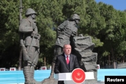 FILE - Turkish President Tayyip Erdogan speaks during a ceremony marking the 104th anniversary of Battle of Canakkale, also known as the Gallipoli Campaign, in Canakkale, Turkey, March 18, 2019.