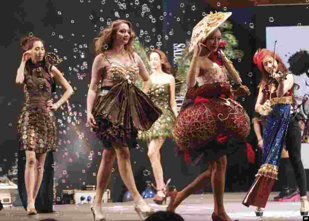Models walk with creations partially made of chocolate during Chocolate Fashion Show as part of Salon du Chocolate in Seoul, South Korea. 