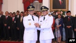 Anies Baswedan - Sandiaga Uno setelah dilantik di Istana Negara, Senin, 16 Oktober 2017.