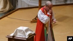 Rev. V. Gene Robinson is is emotional as he walks past the ashes of Matthew Shepard after delivering the homily at the "Thanksgiving and Remembrance of Matthew Shepard" service at Washington National Cathedral in Washington, Oct. 26, 2018.