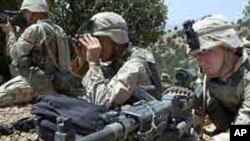 U.S. soldiers of the 82nd Airborne aim at the entrance to a cave outside the village of Malakay, Afghanistan, Saturday, Aug. 10, 2002. Hundreds of Airborne troops flew to the village of Malakay, 5 kilometers (3 miles) from the Pakistan border, where they