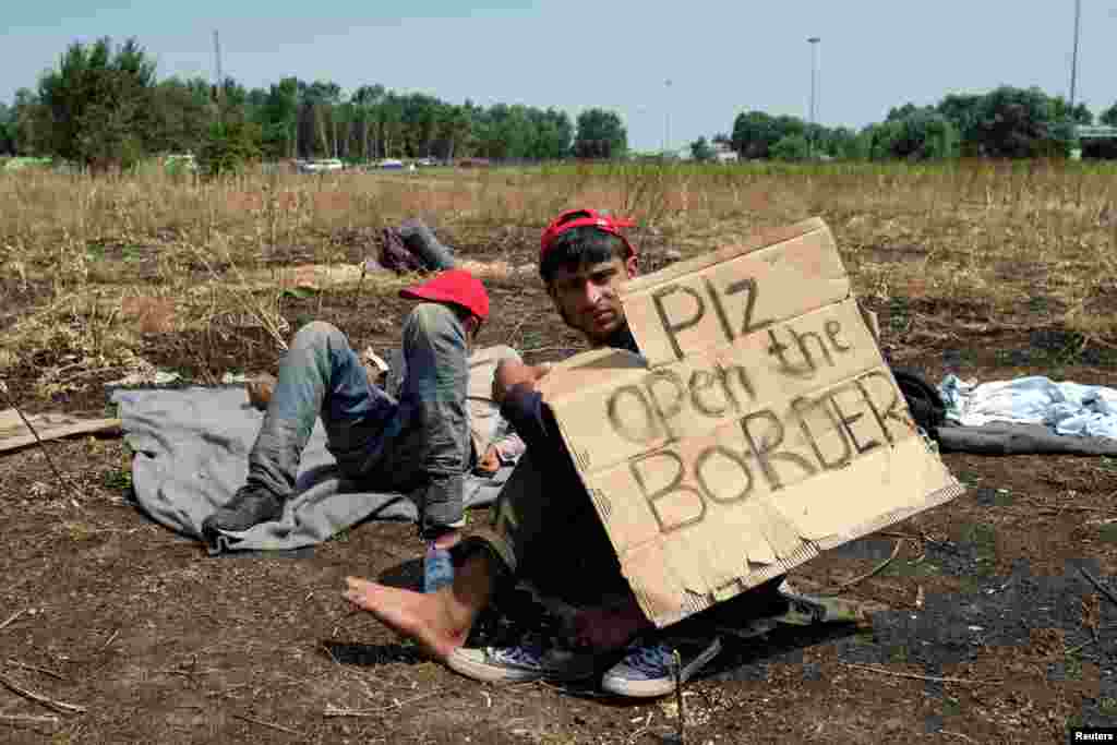 Migrants, mainly from Afghanistan and Pakistan, stage a hunger strike near the village of Horgos, Serbia.