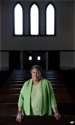 In this March 17, 2018 photo, Clara Ester stands in the Centenary United Methodist Church in Memphis, Tenn.