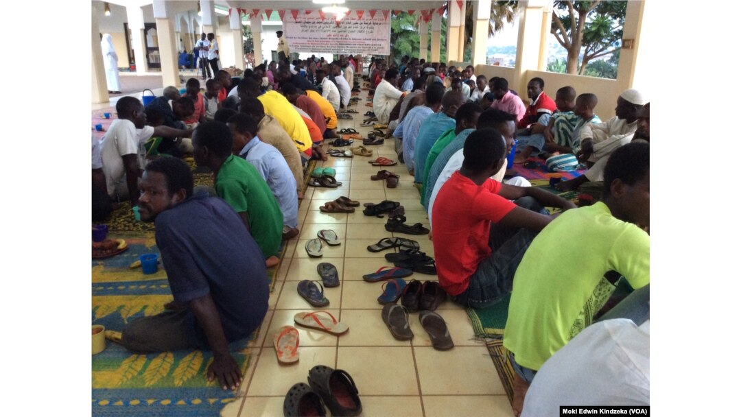 FILE - Christians breaking fast wtih Muslims at a mosque in Yaounde.
