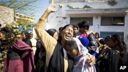 Female Pakistani Christians mourn the death of Shahbaz Bhatti, during a rally in his native town Khushpur near Faisalabad, Pakistan, March 4, 2011