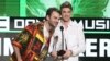 Alex Pall, left, and Andrew Taggart, of The Chainsmokers, accept the award for favorite artist - electronic dance music - at the American Music Awards at the Microsoft Theater, Nov. 20, 2016, in Los Angeles. 