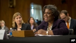 FILE - U.S. Assistant Secretary of State for African Affairs Linda Thomas-Greenfield, right, testifies on Capitol Hill in Washington, January 2014.