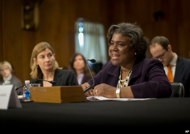 FILE - U.S. Assistant Secretary of State for African Affairs Linda Thomas-Greenfield, right, accompanied by USAID Assistant Administrator for Bureau for Democracy Conflict and Humanitarian Assistance Nancy Lindborg, testifies on Capitol Hill, Jan. 9, 2014.