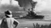 American ships burn during the Japanese attack on Pearl Harbor, Hawaii on Dec. 7, 1942. 