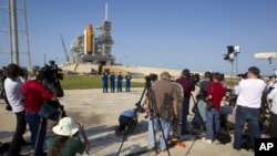 Space shuttle Atlantis STS-135 crew attend a news conference at launch pad 39A at the Kennedy Space Center in Cape Canaveral (file photo)