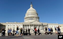 People visit Capitol Hill in Washington, Nov. 8, 2016, on election day.