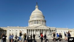 People visit Capitol Hill in Washington, Nov. 8, 2016, on election day.