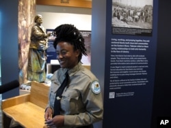 Angela Crenshaw, assistant manager of Harriet Tubman Underground Railroad State Park, talks about exhibits in the new visitor's center during a media preview, March 10, 2017 in Church Creek, Maryland.