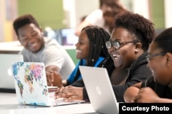 Students gather to do work together at Clarkson University.