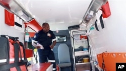 A Paramedic from the Kwazulu-Natal Emergencies Medical Rescue Services (EMR) inspects one of the 150 new Ambulances stationed at Durban's Wentworth Hospital, South Africa, 28 Feb 2010