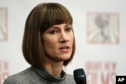 Rachel Crooks speaks at a news conference, Monday, Dec. 11, 2017, in New York to discuss her accusations of sexual misconduct against Donald Trump.
