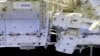 Spacewalking Astronauts Tackle Battery, Cable Work