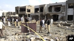 A view of destruction caused by bombing in Karachi, Pakistan , September 19, 2011.