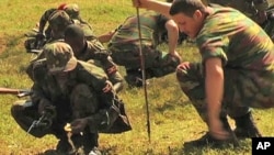 Ugandan peacekeepers being trained by French Foreign Legion instructors