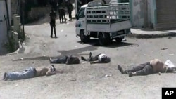 Xác người chết tại xã Bayda village (ngày 2/5/2013)