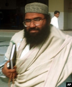 FILE - Muslim cleric Masood Azhar arrives at Karachi airport, Jan. 22, 2000.