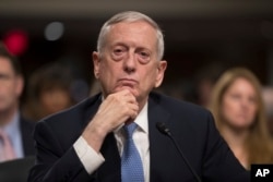 Defense Secretary-designate James Mattis listens to a question during his confirmation hearing before the Senate Armed Services Committee on Capitol Hill in Washington, Jan. 12, 2017.