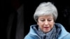PM May Says She'll Quit Once Britain Leaves EU
