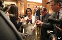 House Minority Leader Nancy Pelosi, of California, speaks to reporters after staging a eight-hour filibuster, on Capitol Hill in Washington, Feb. 7, 2018. Pelosi was attempting to force a House vote on protections for the "Dreamer" immigrants.