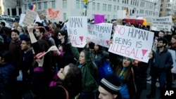 FILE - Thousands of demonstrators rally against anticipated immigration policies laid out by now President-elect Donald Trump during his campaign, during a march, Nov. 13, 2016, in New York City.