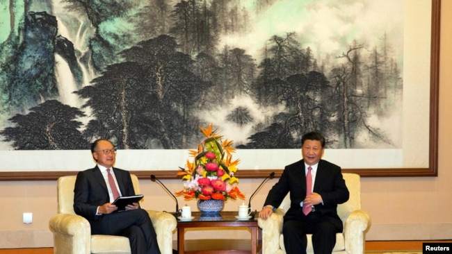世界银行前行长金墉2018年7月16日在北京钓鱼台国宾馆与中国国家主席习近平会面。